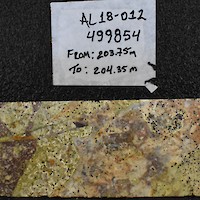 AL18-012_ Tigre vein zone_DSC_0305 – “Tigre vein zone cut by hole AL18-012.  Note quartz-vein matrix of brecciated and epidote-altered volcanic host rock.  Sample Interval 203.75-204.35 m (0.60 m) assayed 497 g/t Ag, 0.14% Cu, 0.56% Pb, 0.27% Zn.