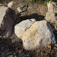 Boulders interpreted to be from Cacharamba, more studies are required